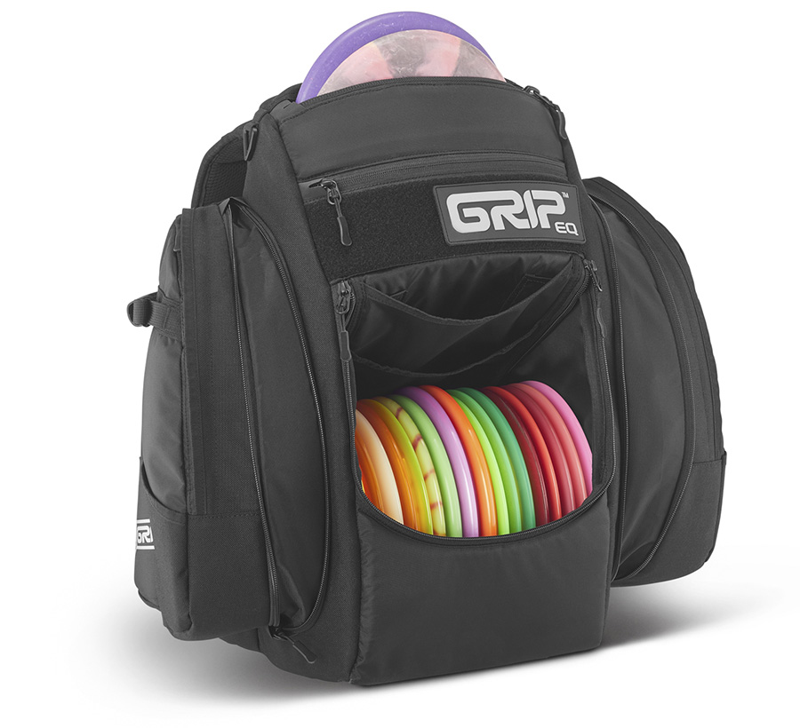 A black GRIPeq BX3 disc golf bag with the front pocket open and loaded with discs.