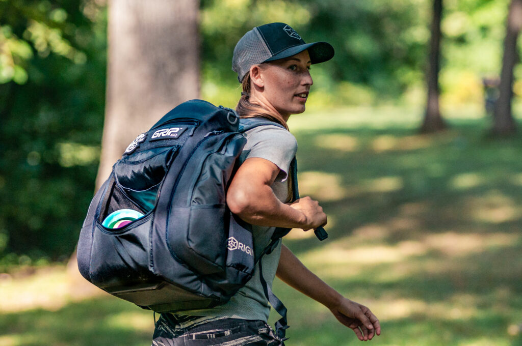 Paige Pierce with Disc golf bag by GRIPeq