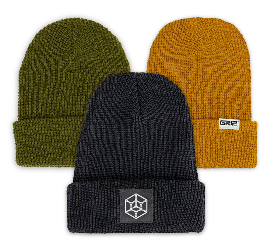 Three GRIPeq beanies on a white background. The colors shown are olive, wheat, and black. There are GRIPeq logos on each one.