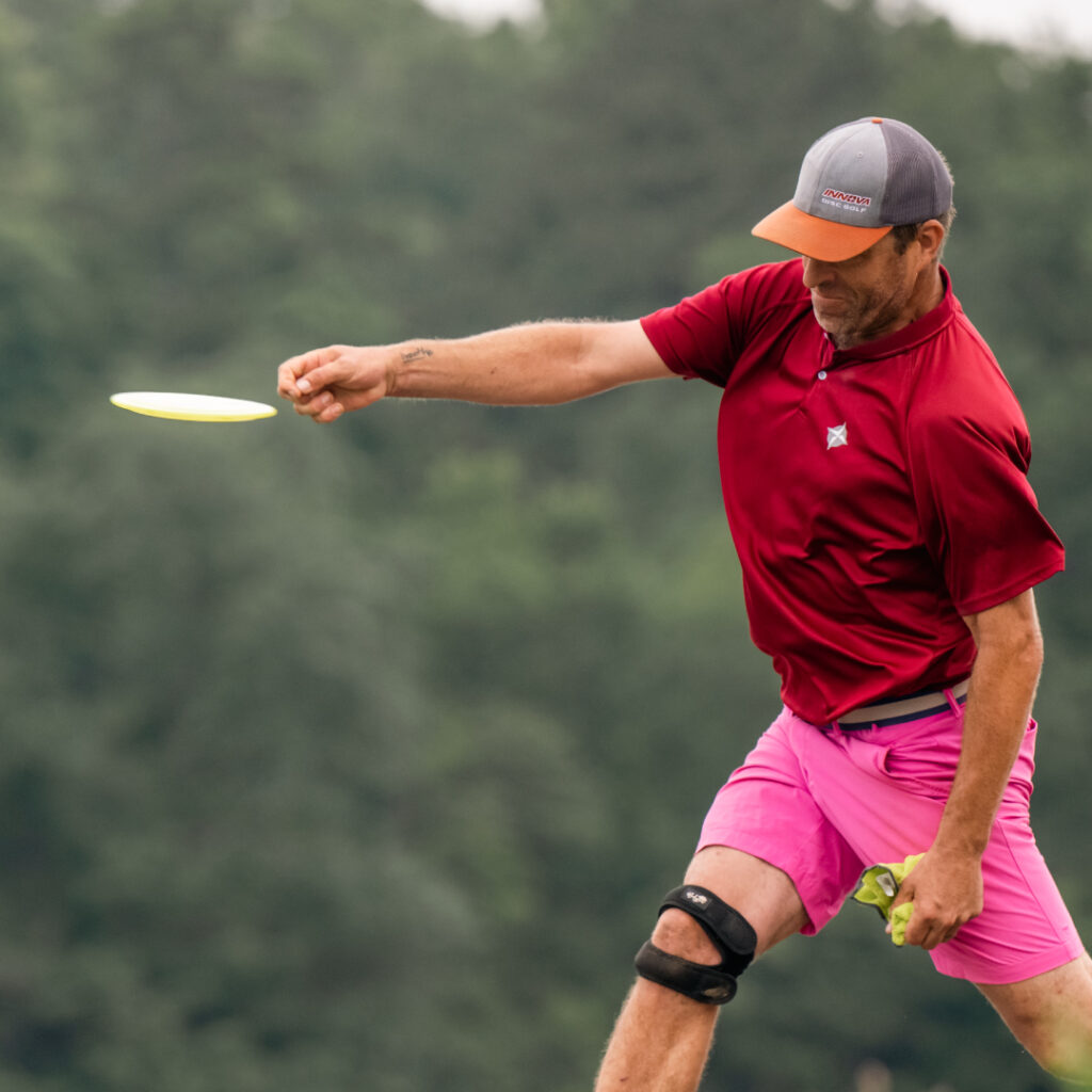 Joe Rovere just releasing a disc after a throw.