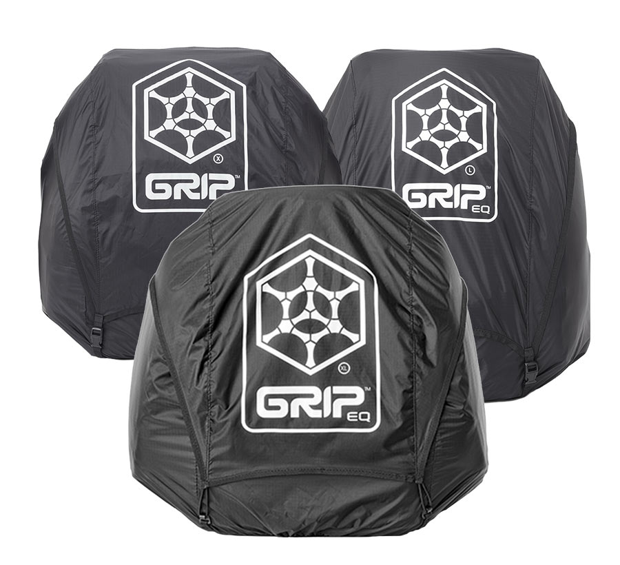 Three GRIPeq bags on a white background with rain covers on them.