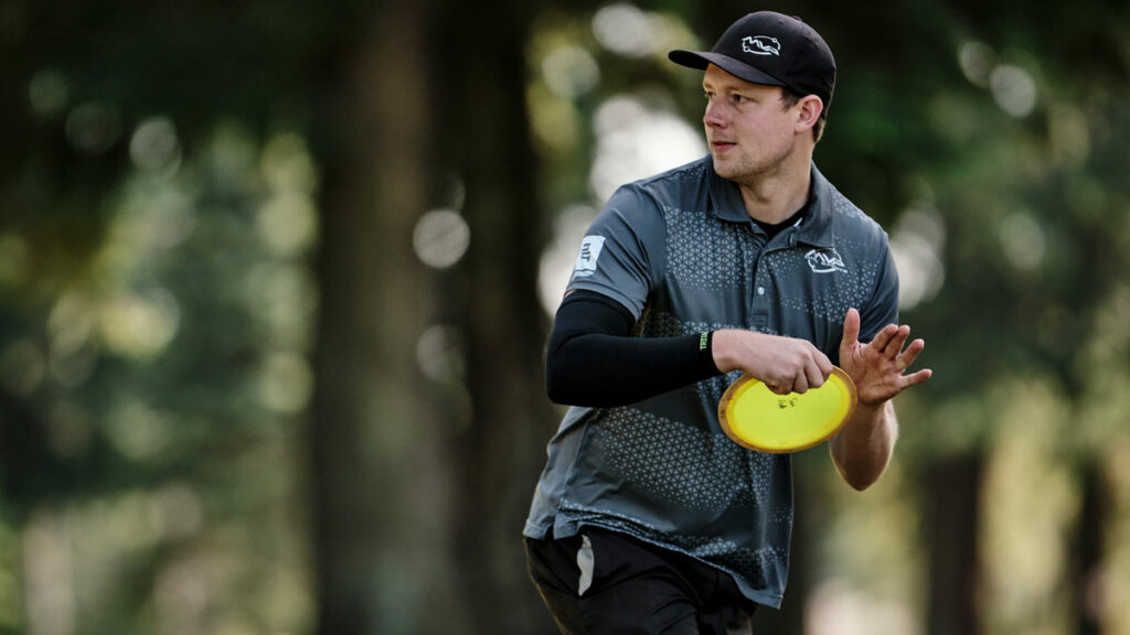 Team GRIPeq member, Simon Lizotte, gets ready to tee off with a disc in-hand.