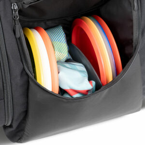 A large disc divider in a GRIPeq bag with discs and a towel in the compartments.