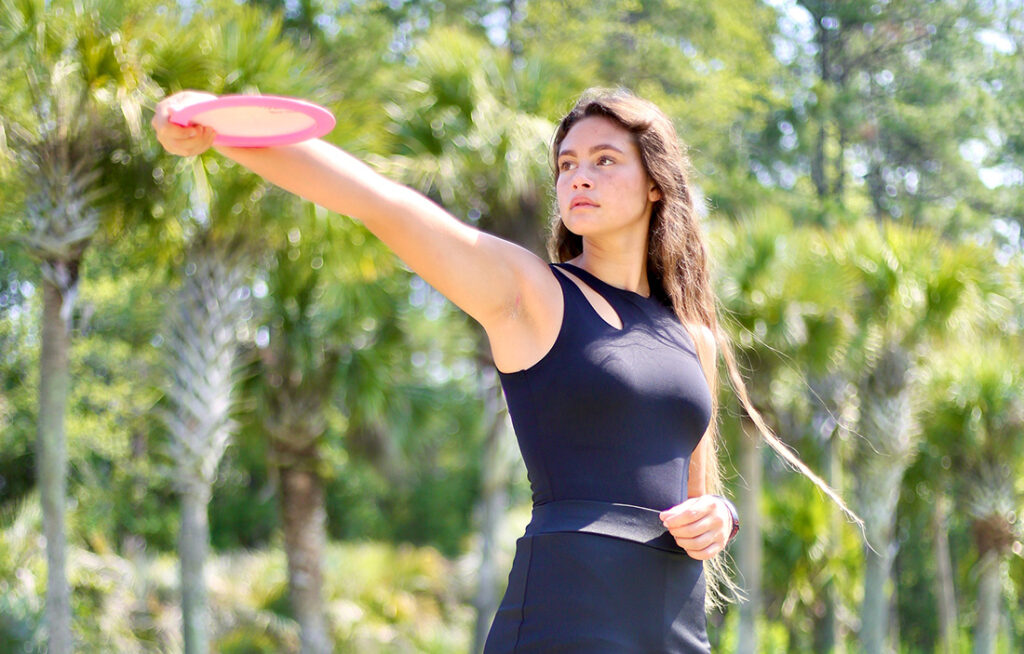Team GRIPeq member Trinity Bryant with disc in hand.