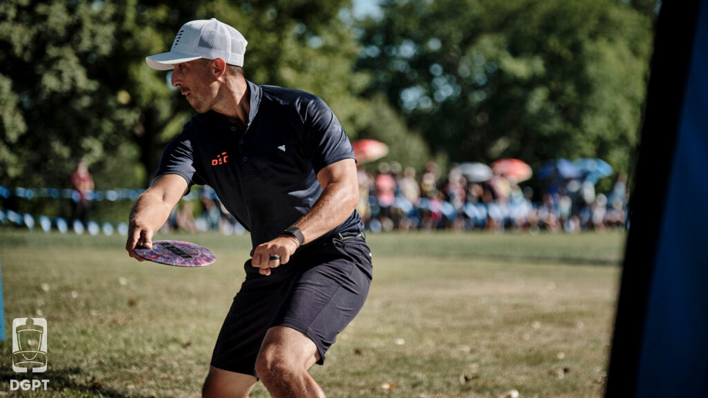 Paul McBeth winds back to throw a disc.