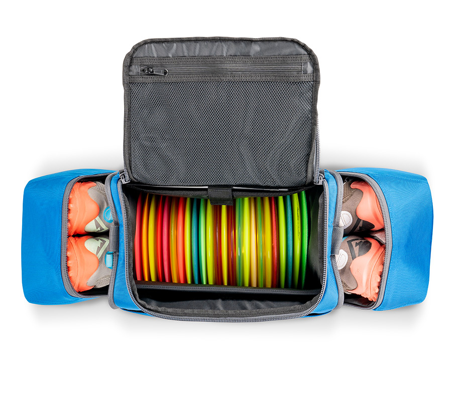 Blue disc golf duffel loaded with discs and shoes