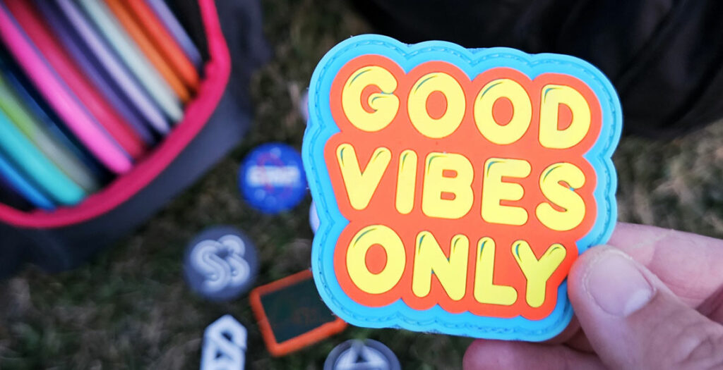 A close up of a velcro patch that says Good Vibes Only.