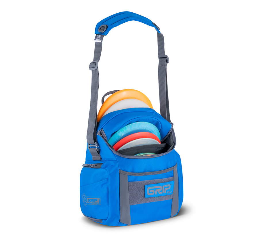 Side view of a GRIPeq G2 bag in ocean color, loaded with discs and water bottles.